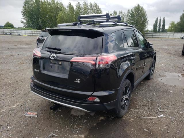 Photo 4 from auction – 2018 TOYOTA RAV4 SE with VIN 2T3JFREV7JW737284