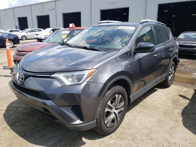 Photo 2 from auction – 2016 TOYOTA RAV4 LE with VIN JTMZFREV9GJ093975