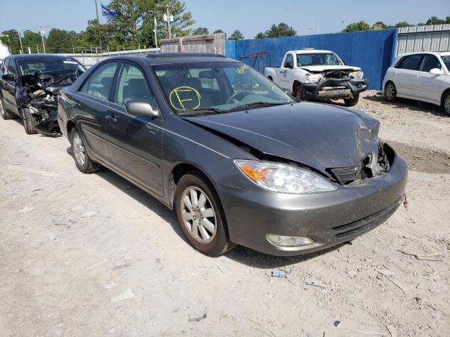 TOYOTA CAMRY LE 2004 with VIN 4T1BE32KX4U915054 - Photo from auction