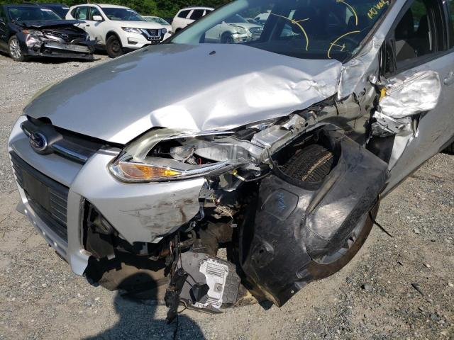 Photo 9 from auction – 2014 FORD FOCUS SE with VIN 1FADP3F21EL215759
