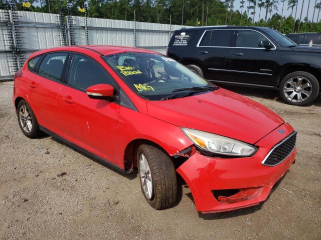 FORD FOCUS SE 2015 with VIN 1FADP3K2XFL233135 - Photo from auction