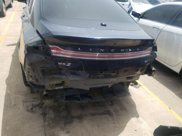 Photo 9 from auction – 2014 LINCOLN MKZ with VIN 3LN6L2GK7ER829820