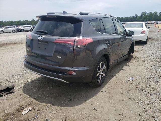 Photo 4 from auction – 2017 TOYOTA RAV4 XLE with VIN JTMWFREV4HJ124652