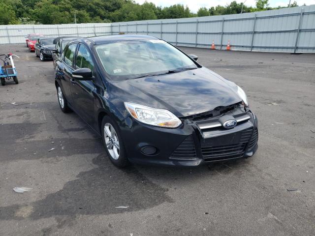FORD FOCUS SE 2014 with VIN 1FADP3F24EL203024 - Photo from auction