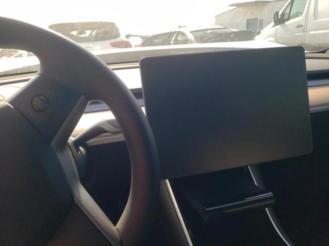 Photo 8 from auction – 2021 TESLA MODEL Y with VIN 5YJYGDEE6MF080356