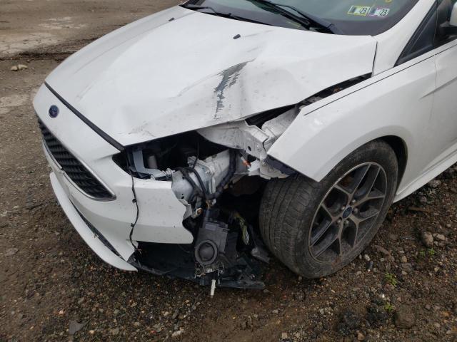 Photo 9 from auction – 2016 FORD FOCUS SE with VIN 1FADP3F24GL261878