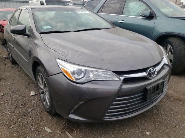 TOYOTA CAMRY LE 2017 with VIN 4T1BF1FKXHU618951 - Photo from auction