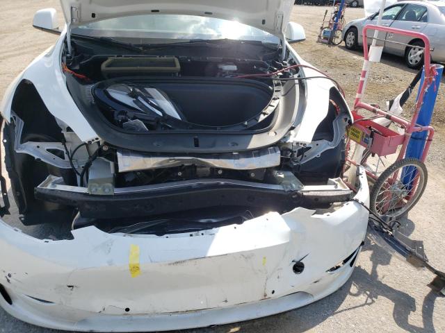 Photo 9 from auction – 2021 TESLA MODEL Y with VIN 5YJYGDEE3MF207287