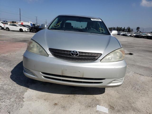 Photo 9 from auction – 2003 TOYOTA CAMRY LE with VIN 4T1BF30KX3U559588