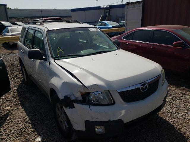 MAZDA TRIBUTE I 2011 with VIN 4F2CY0C7XBKM01786 - Photo from auction