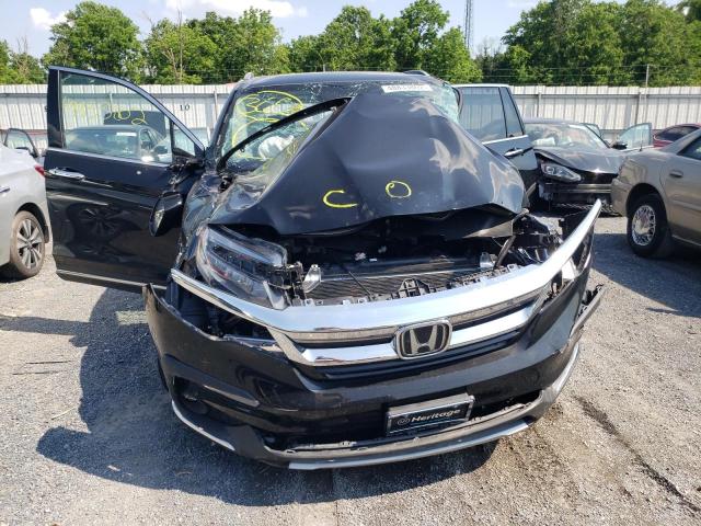 Photo 7 from auction – 2021 HONDA PILOT TOUR with VIN 5FNYF6H92MB071540