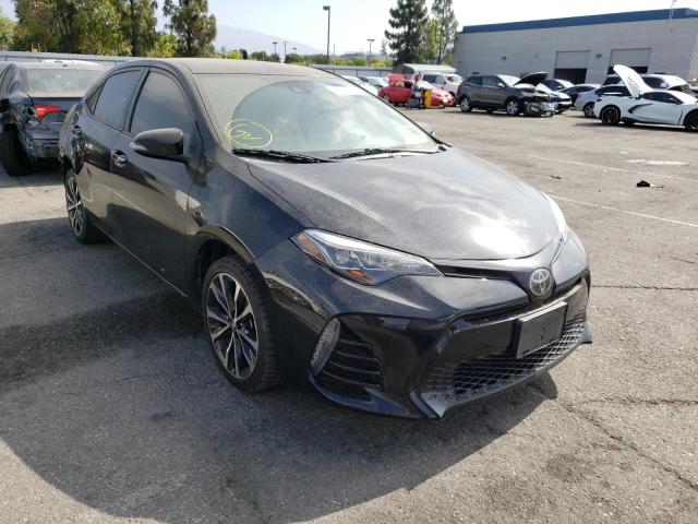 TOYOTA COROLLA L 2018 with VIN 5YFBURHE8JP767152 - Photo from auction