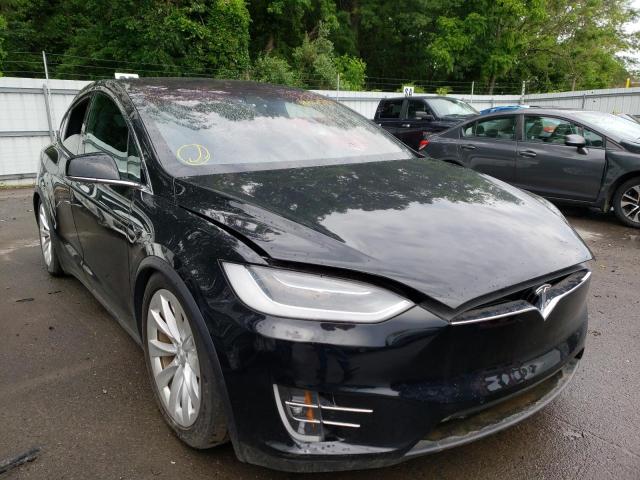 TESLA MODEL X 2018 with VIN 5YJXCDE26JF088711 - Photo from auction