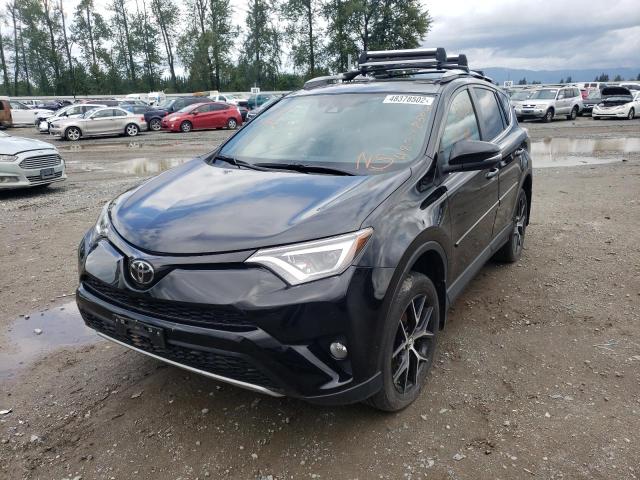 Photo 2 from auction – 2018 TOYOTA RAV4 SE with VIN 2T3JFREV7JW737284