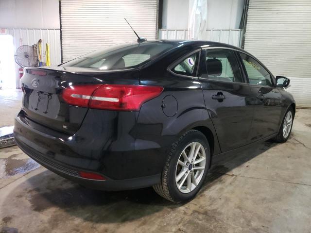 Photo 4 from auction – 2016 FORD FOCUS SE with VIN 1FADP3F28GL265738