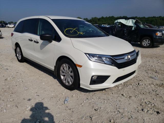 HONDA ODYSSEY LX 2018 with VIN 5FNRL6H20JB097338 - Photo from auction