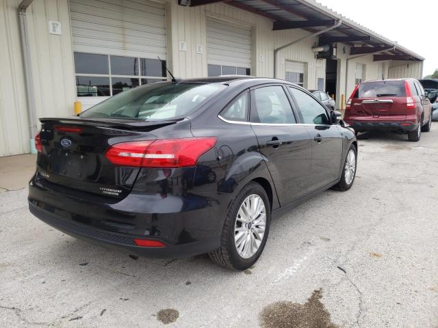 Photo 4 from auction – 2015 FORD FOCUS TITA with VIN 1FADP3J21FL366741