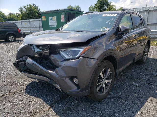Photo 2 from auction – 2017 TOYOTA RAV4 XLE with VIN JTMRFREV7HJ707875