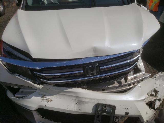Photo 7 from auction – 2018 HONDA PILOT ELIT with VIN 5FNYF6H0XJB043885