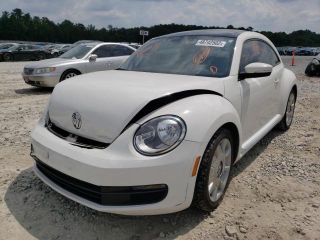 Photo 2 from auction – 2012 VOLKSWAGEN BEETLE with VIN 3VWJX7AT8CM658326