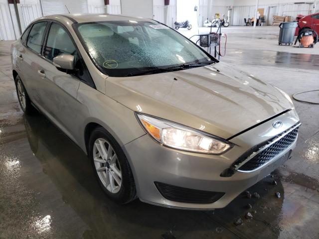 FORD FOCUS SE 2015 with VIN 1FADP3F21FL210885 - Photo from auction