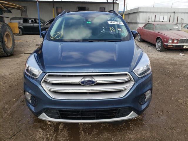 Photo 9 from auction – 2018 FORD ESCAPE SE with VIN 1FMCU9GD2JUC19918