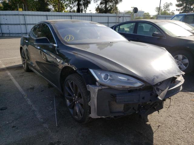 TESLA MODEL S 2014 with VIN 5YJSA1H10EFP56137 - Photo from auction