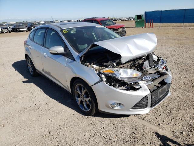 FORD FOCUS SE 2013 with VIN 1FADP3K21DL184081 - Photo from auction