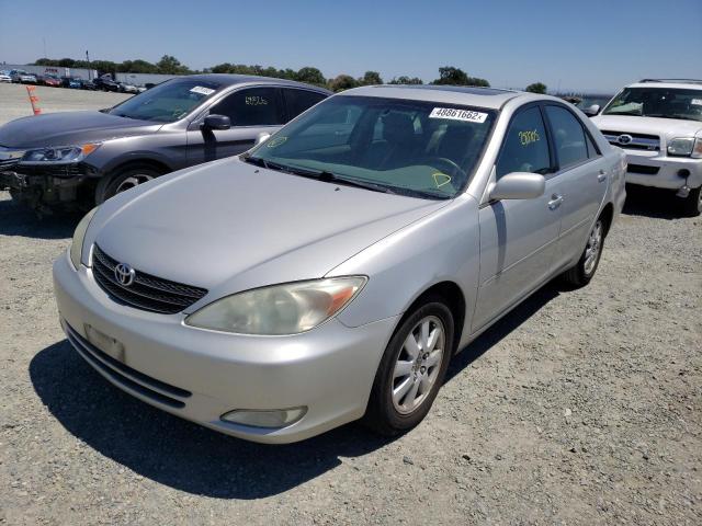 Photo 2 from auction – 2004 TOYOTA CAMRY LE with VIN 4T1BF32K24U070536