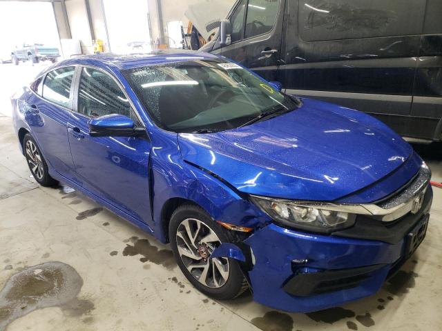 HONDA CIVIC EX 2018 with VIN 19XFC2F74JE205461 - Photo from auction
