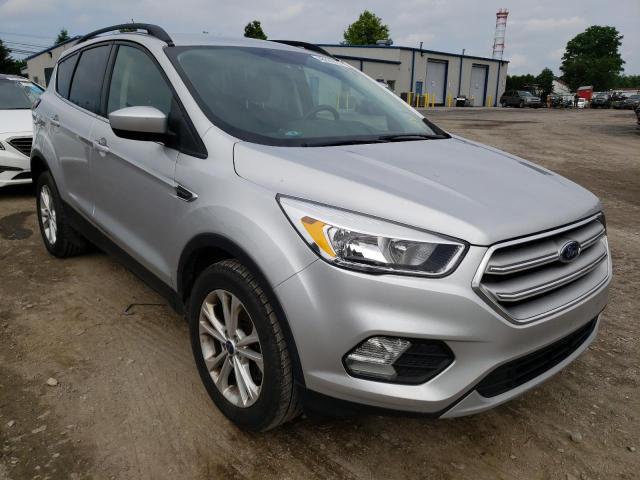 FORD ESCAPE SE 2018 with VIN 1FMCU0GD7JUC54174 - Photo from auction