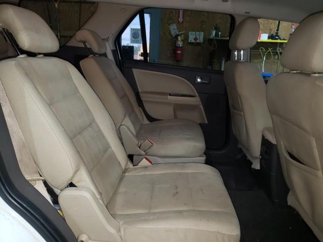 Photo 6 from auction – 2009 FORD TAURUS X S with VIN 1FMDK02W39GA03858