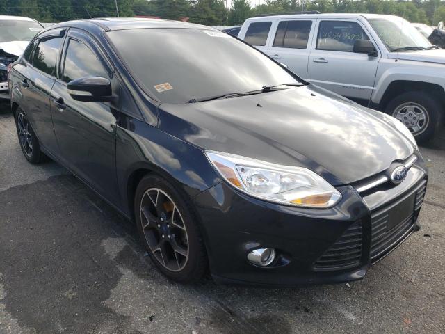 FORD FOCUS SE 2014 with VIN 1FADP3F27EL201185 - Photo from auction