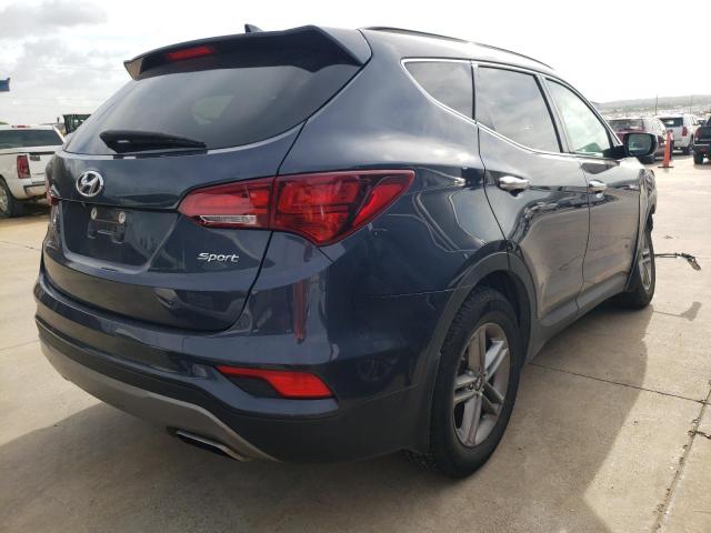 Photo 4 from auction – 2017 HYUNDAI SANTA FE S with VIN 5NMZU3LB0HH019007