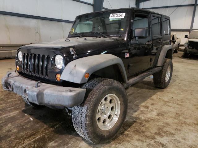 Photo 2 from auction – 2011 JEEP WRANGLER U with VIN 1J4BA3H12BL584725