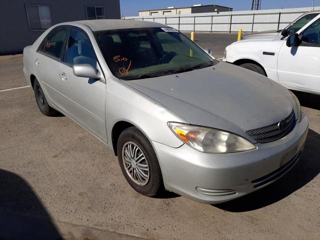 TOYOTA CAMRY LE 2002 with VIN JTDBE32K720004107 - Photo from auction