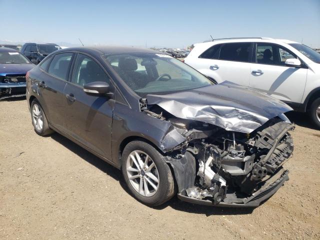 FORD FOCUS SE 2018 with VIN 1FADP3FEXJL303410 - Photo from auction