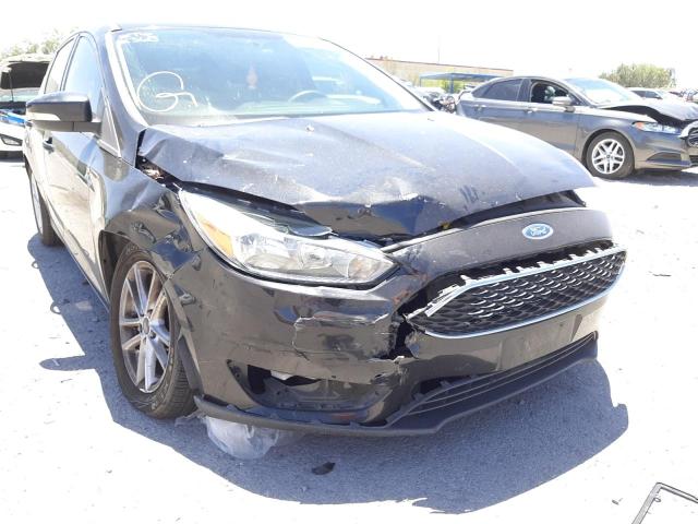 Photo 9 from auction – 2015 FORD FOCUS SE with VIN 1FADP3K20FL316198