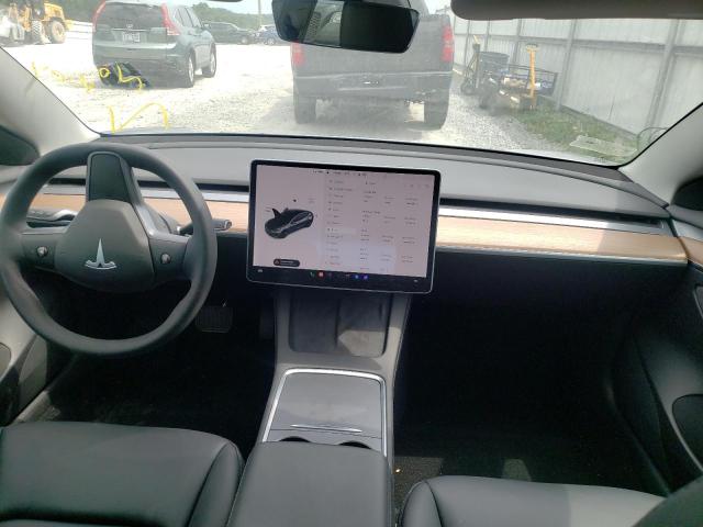 Photo 9 from auction – 2022 TESLA MODEL 3 with VIN 5YJ3E1EB1NF174649