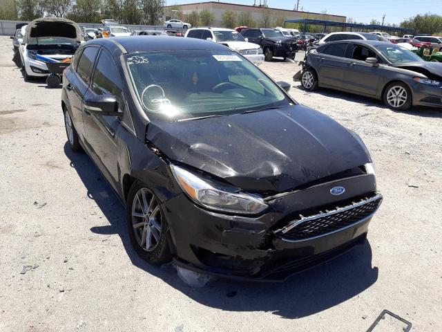 FORD FOCUS SE 2015 with VIN 1FADP3K20FL316198 - Photo from auction