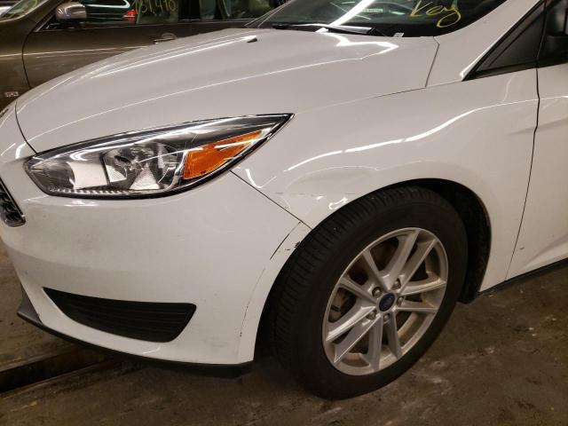 Photo 9 from auction – 2018 FORD FOCUS SE with VIN 1FADP3F21JL302801