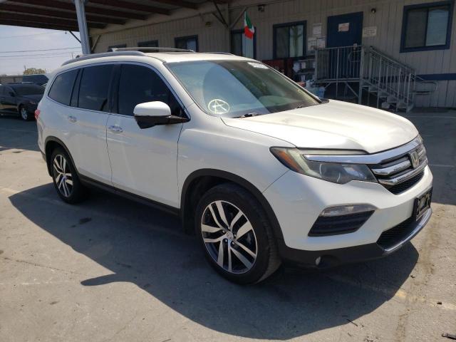 HONDA PILOT TOUR 2016 with VIN 5FNYF5H93GB019865 - Photo from auction