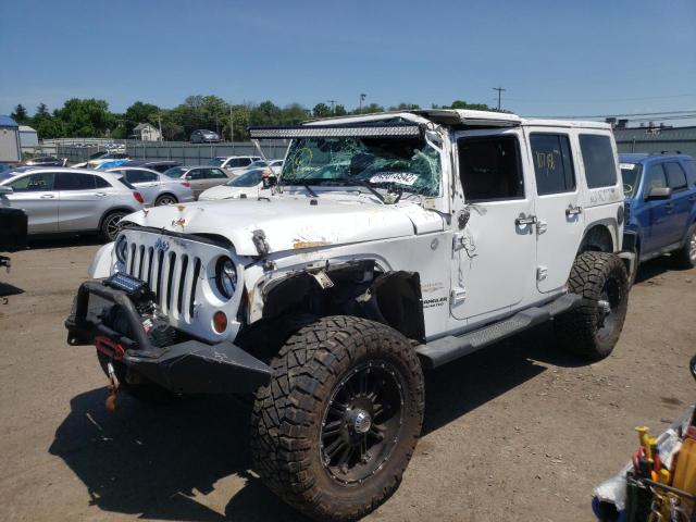Photo 2 from auction – 2012 JEEP WRANGLER U with VIN 1C4BJWEG1CL108659