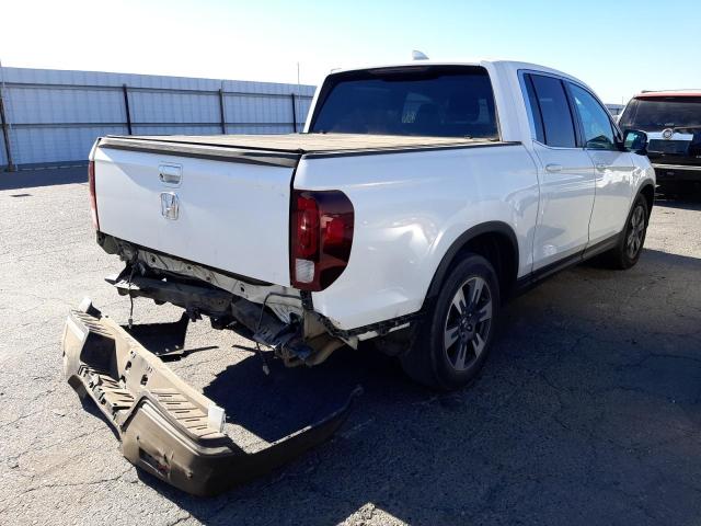 Photo 4 from auction – 2018 HONDA RIDGELINE with VIN 5FPYK2F62JB001178