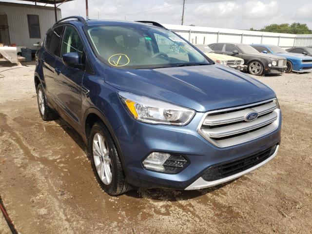FORD ESCAPE SE 2018 with VIN 1FMCU9GD2JUC19918 - Photo from auction