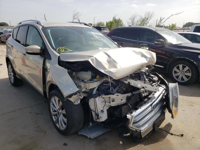 FORD ESCAPE TIT 2017 with VIN 1FMCU0J94HUF06834 - Photo from auction
