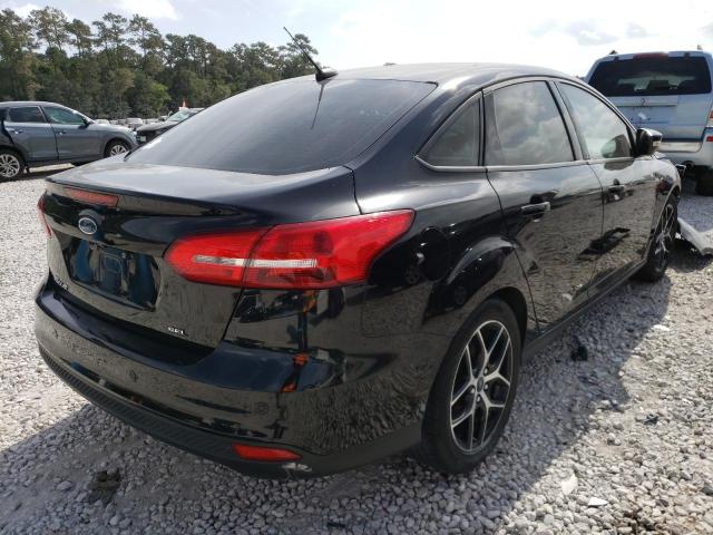 Photo 4 from auction – 2017 FORD FOCUS SEL with VIN 1FADP3H24HL313623