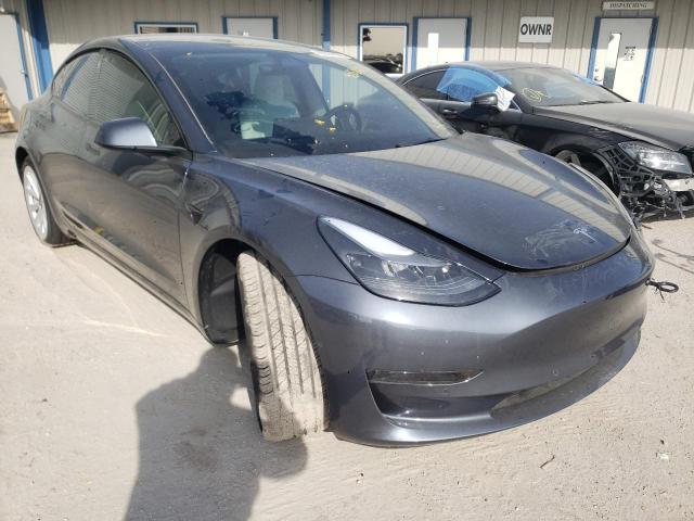 TESLA MODEL 3 2022 with VIN 5YJ3E1EAXNF155301 - Photo from auction