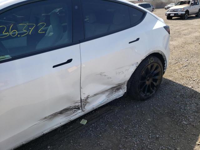 Photo 9 from auction – 2021 TESLA MODEL Y with VIN 5YJYGDEE5MF157525