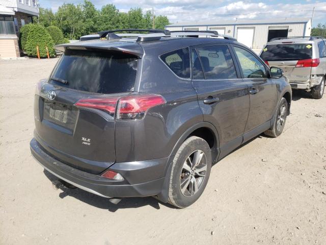 Photo 4 from auction – 2016 TOYOTA RAV4 XLE with VIN JTMRFREV0GD197043